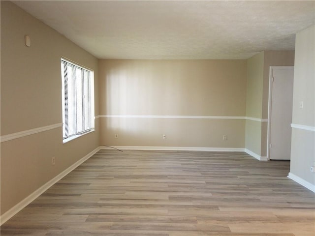 296 Country Club Dr, Jonesboro, GA 30238 - unfurnished room featuring light wood-style flooring and baseboards