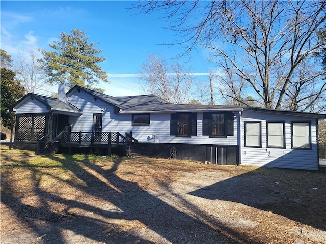 view of front of house featuring a deck