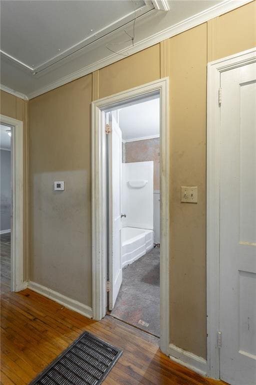 600 Forrest Rd, Fort Oglethorpe, GA 30742 - hall featuring attic access, wood finished floors, and crown molding