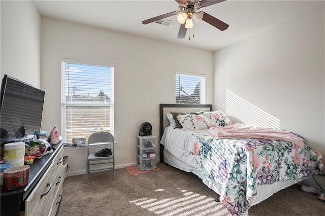 carpeted bedroom featuring ceiling fan