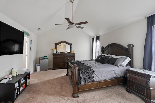 carpeted bedroom featuring ceiling fan and lofted ceiling