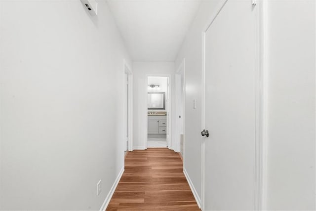 hallway featuring hardwood / wood-style floors