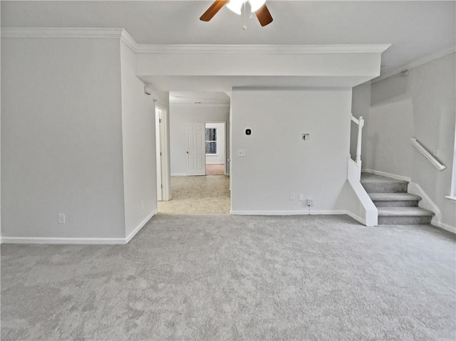 unfurnished living room with baseboards, stairs, carpet, and ornamental molding