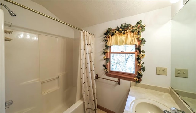 bathroom featuring shower / tub combo with curtain and vanity