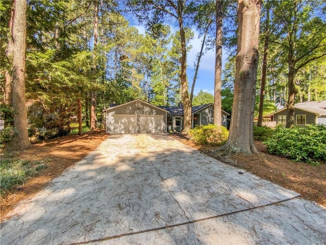 single story home featuring a garage