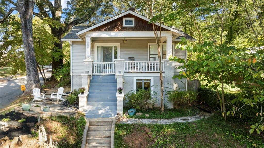 bungalow-style home featuring covered porch