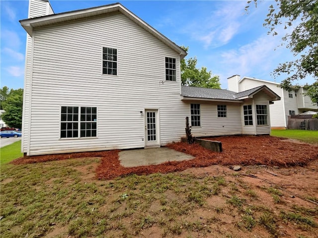 2397 Charleston Ter, Decatur, GA 30034 - rear view of property with a chimney and a patio
