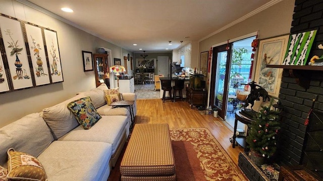 2479 Landeau Cir, Tucker, GA 30084 - living room with crown molding, light wood finished floors, and recessed lighting