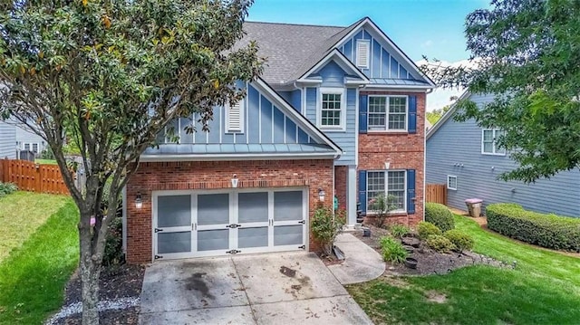 7835 Keepsake Ln, Flowery Branch, GA 30542 - view of front of house featuring driveway, brick siding, board and batten siding, and a shingled roof