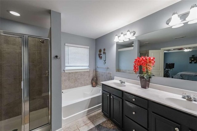 7835 Keepsake Ln, Flowery Branch, GA 30542 - ensuite bathroom with a bath, a shower stall, tile patterned floors, double vanity, and ceiling fan