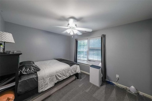 7835 Keepsake Ln, Flowery Branch, GA 30542 - bedroom featuring baseboards, dark carpet, and a ceiling fan