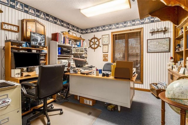 office area featuring carpet floors and a textured ceiling