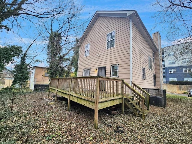 rear view of house with a deck