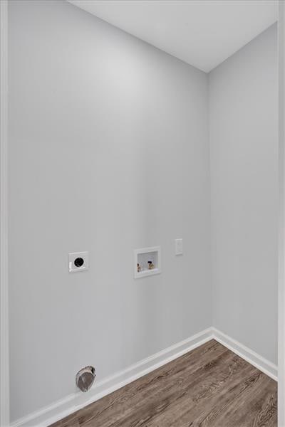 1766 Blossom Ln, Austell, GA 30168 - washroom with laundry area, hookup for a washing machine, baseboards, electric dryer hookup, and dark wood-type flooring