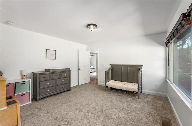 living area with light carpet