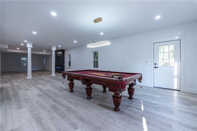 game room featuring ornate columns, light wood-style floors, and recessed lighting