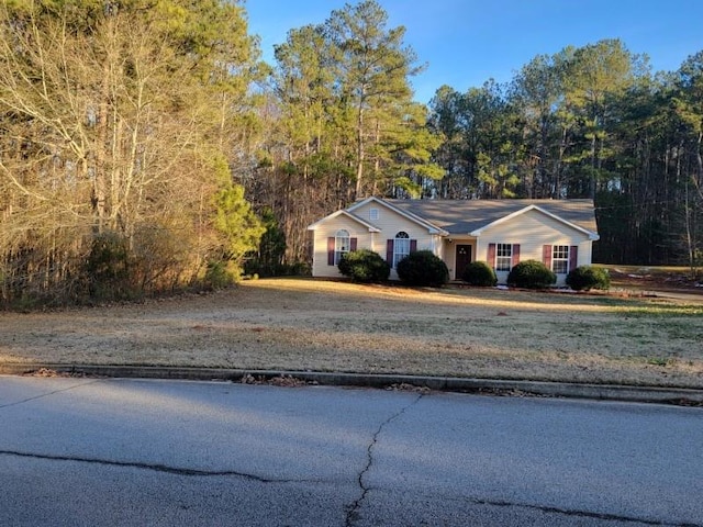 exterior space with a front lawn