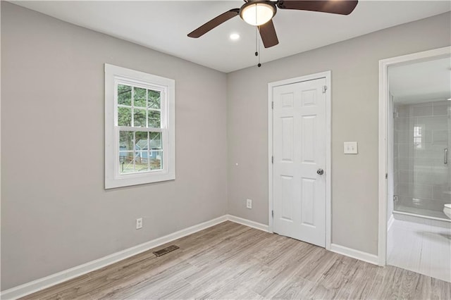 unfurnished bedroom featuring light hardwood / wood-style flooring and ceiling fan