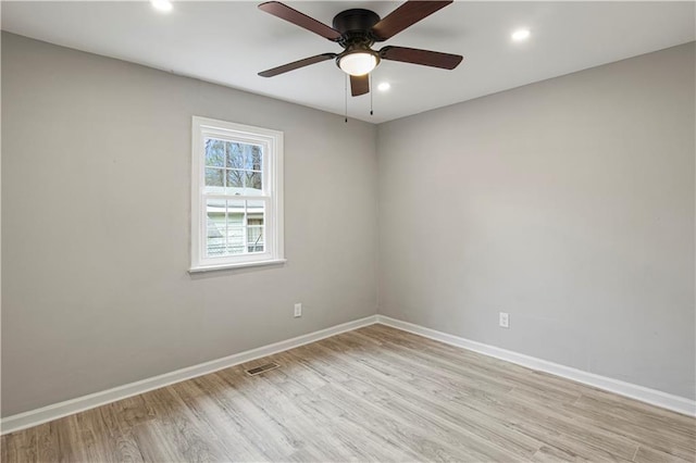 unfurnished bedroom with ceiling fan and light hardwood / wood-style floors