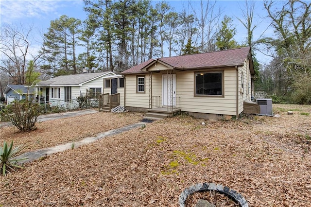 view of front of property featuring cooling unit