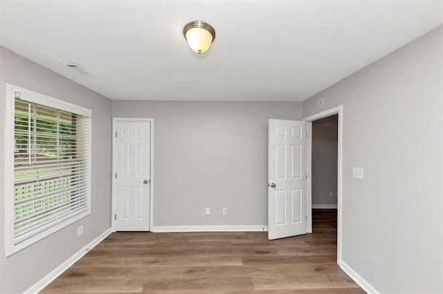 5514 E Stoneway Ct, Villa Rica, GA 30180 - unfurnished room featuring wood finished floors and baseboards