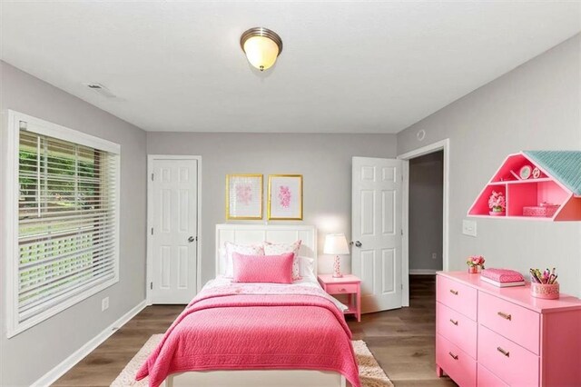 5514 E Stoneway Ct, Villa Rica, GA 30180 - bedroom with wood finished floors and baseboards