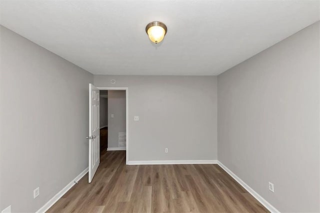 5514 E Stoneway Ct, Villa Rica, GA 30180 - spare room with wood finished floors and baseboards