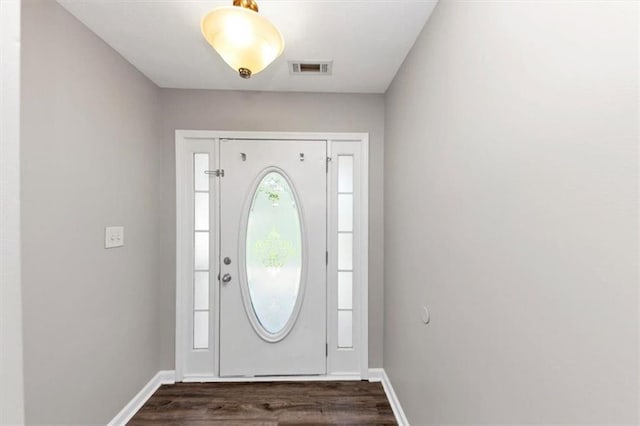 5514 E Stoneway Ct, Villa Rica, GA 30180 - foyer entrance featuring dark wood finished floors and baseboards