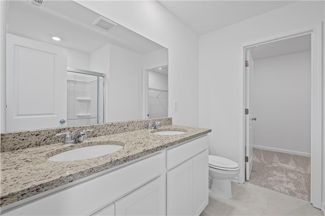 3019 Orwell Dr, Gainesville, GA 30507 - bathroom featuring toilet, a shower stall, a spacious closet, double vanity, and tile patterned floors
