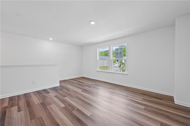 3019 Orwell Dr, Gainesville, GA 30507 - spare room with wood finished floors, baseboards, and recessed lighting