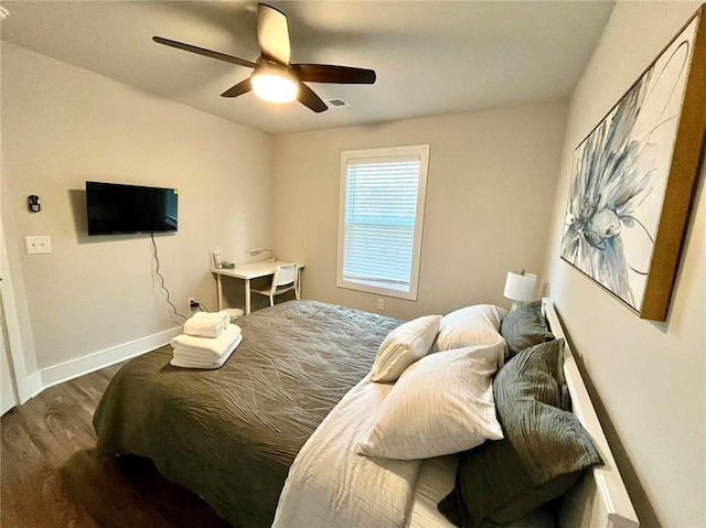 bedroom featuring wood-type flooring and ceiling fan