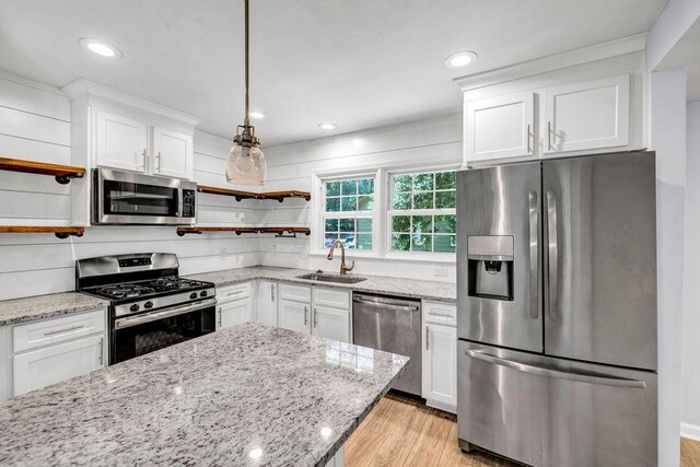 interior space featuring ceiling fan and light hardwood / wood-style floors