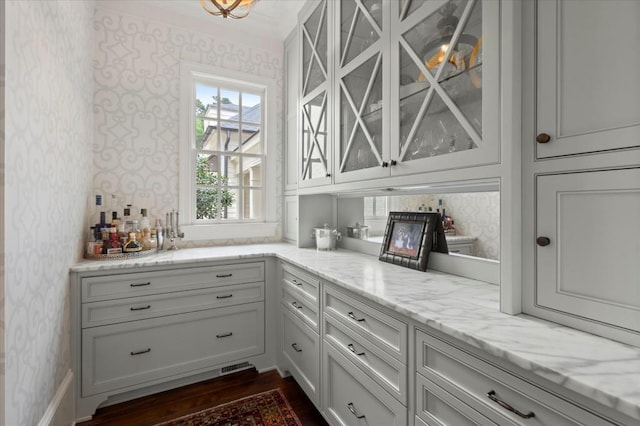6440 Westchester Pl, Cumming, GA 30040 - bar featuring wallpapered walls and dark wood-style flooring