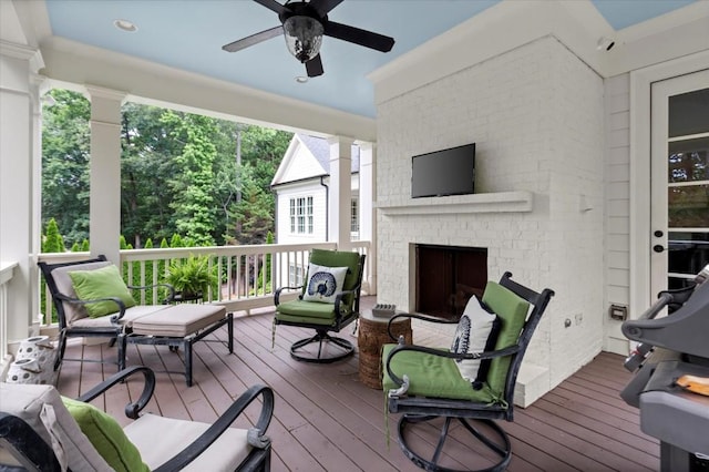 6440 Westchester Pl, Cumming, GA 30040 - wooden terrace featuring a ceiling fan and an outdoor brick fireplace