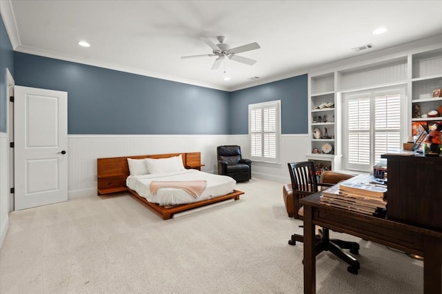 6440 Westchester Pl, Cumming, GA 30040 - bedroom with an office area, a wainscoted wall, ornamental molding, carpet flooring, and ceiling fan