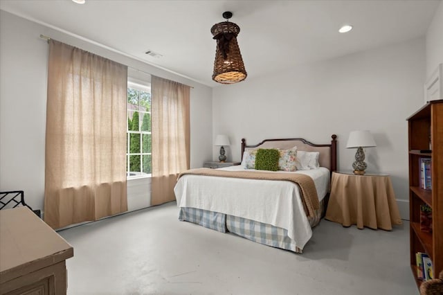 6440 Westchester Pl, Cumming, GA 30040 - bedroom featuring finished concrete floors and recessed lighting