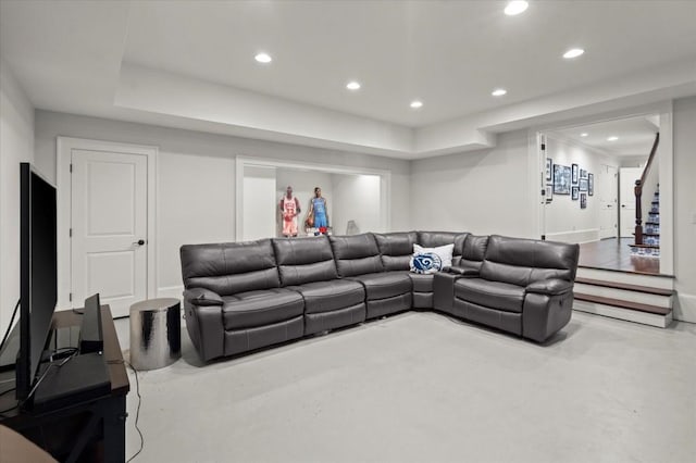 6440 Westchester Pl, Cumming, GA 30040 - living room featuring recessed lighting, stairs, finished concrete flooring, baseboards, and a raised ceiling