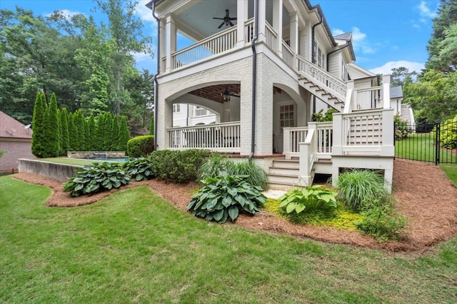 6440 Westchester Pl, Cumming, GA 30040 - view of home's exterior with a ceiling fan, a balcony, and stairs