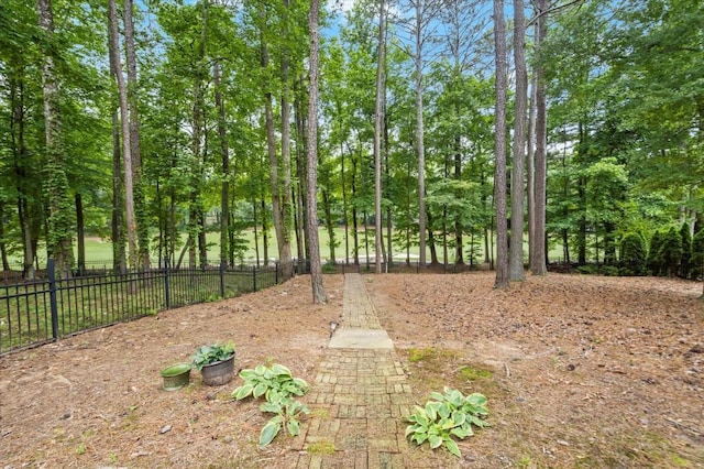 6440 Westchester Pl, Cumming, GA 30040 - view of yard featuring view of wooded area