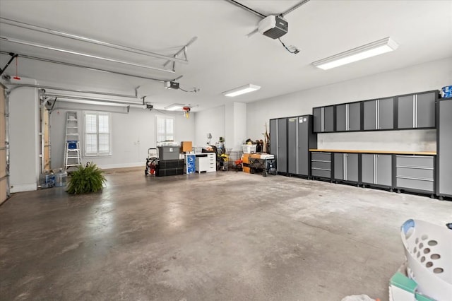 6440 Westchester Pl, Cumming, GA 30040 - garage featuring a garage door opener