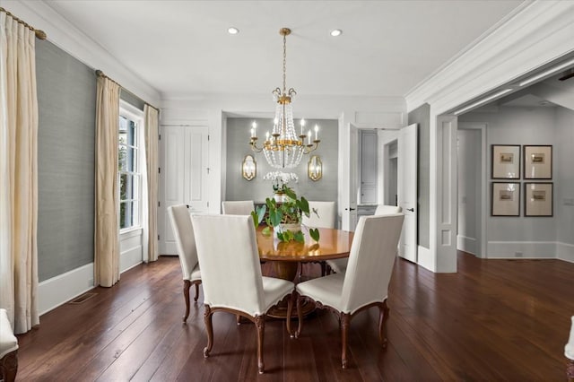 6440 Westchester Pl, Cumming, GA 30040 - dining area with a chandelier, dark wood finished floors, baseboards, ornamental molding, and recessed lighting