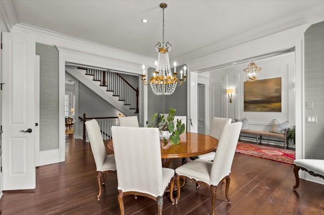 6440 Westchester Pl, Cumming, GA 30040 - dining room with a chandelier, crown molding, hardwood / wood-style floors, and stairs