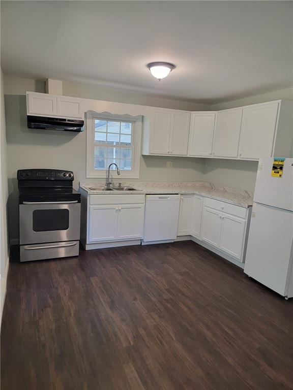 kitchen with white cabinetry, light stone countertops, dark wood-type flooring, sink, and white appliances