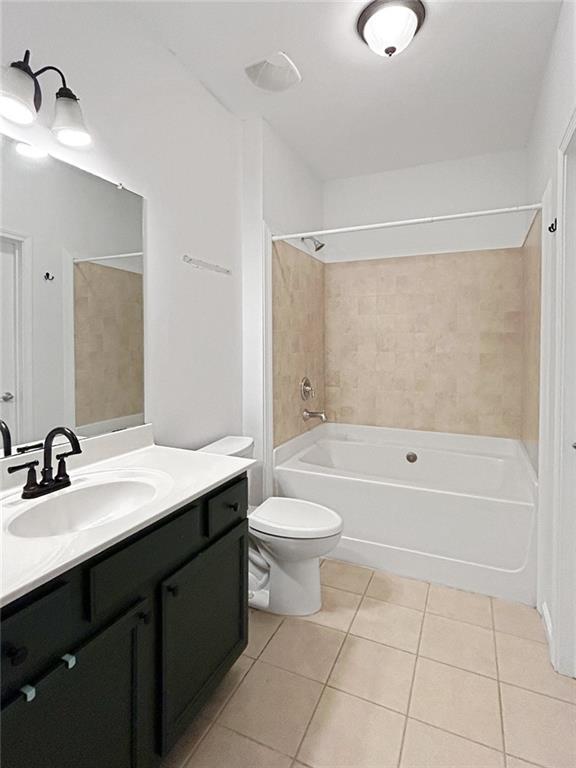 3040 Peachtree Rd NW Unit 1501, Atlanta, GA 30305 - bathroom featuring tile patterned floors, vanity, shower / bathtub combination, and toilet