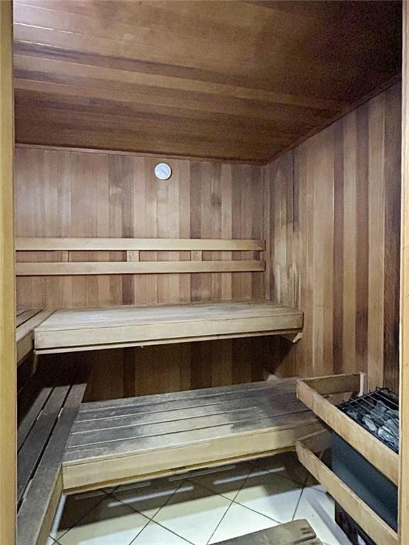 3040 Peachtree Rd NW Unit 1501, Atlanta, GA 30305 - sauna featuring wooden ceiling, wood walls, and tile patterned floors