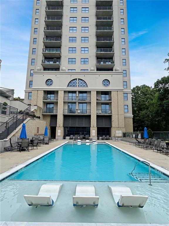 3040 Peachtree Rd NW Unit 1501, Atlanta, GA 30305 - community pool with a patio area