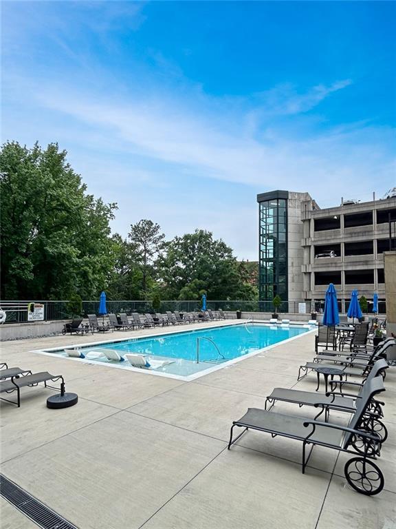 3040 Peachtree Rd NW Unit 1501, Atlanta, GA 30305 - community pool with a patio