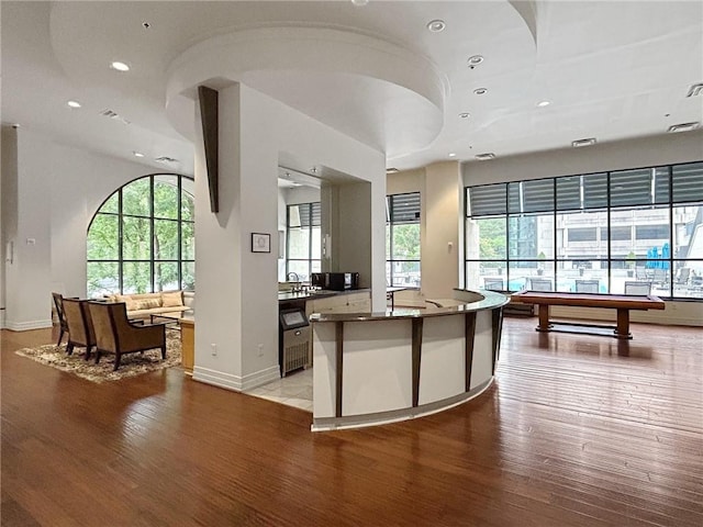 3040 Peachtree Rd NW Unit 1501, Atlanta, GA 30305 - interior space with light wood-style flooring, recessed lighting, plenty of natural light, baseboards, and a sink