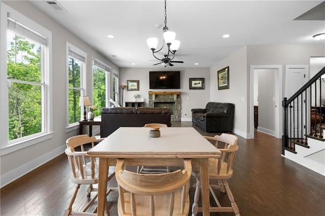 35 Bridgestone Way SE, Cartersville, GA 30120 - dining area with a chandelier, baseboards, stairway, dark wood-type flooring, and recessed lighting