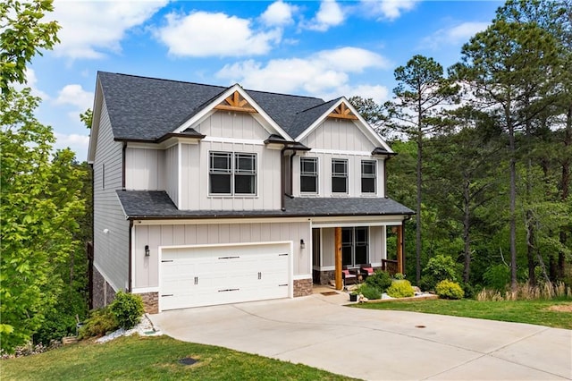 35 Bridgestone Way SE, Cartersville, GA 30120 - craftsman house with covered porch, driveway, an attached garage, board and batten siding, and roof with shingles